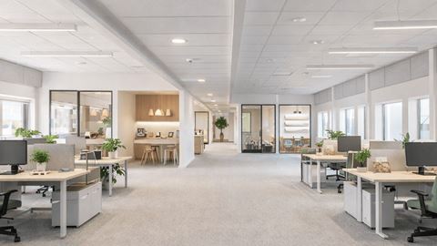 Lyst og moderne storrumskontor med skriveborde og mødefaciliteter på Hedegaardsvej 88 på Amager.